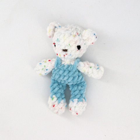 Crocheted Fable Babies Speckled White Bear in Blue Overalls - Arts and Heritage St. Albert
