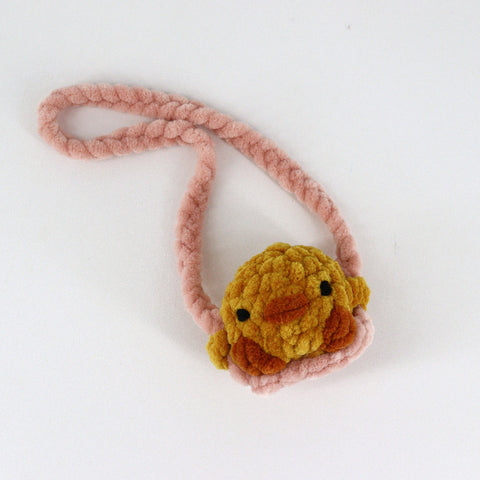Crocheted Bird on a Swing Plushie - Arts and Heritage St. Albert