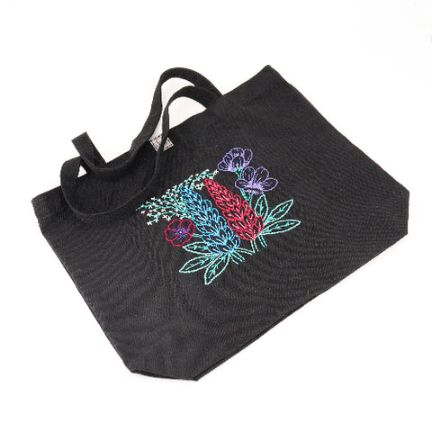 Black tote bag with colorful floral embroidery 
