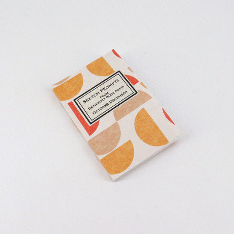 Notebook with geometric pattern on a white background
