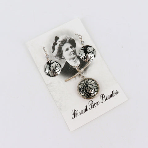 Upcycled Biscuit Box Beauties jewelry set featuring earrings and pendant made from repurposed biscuit box materials.