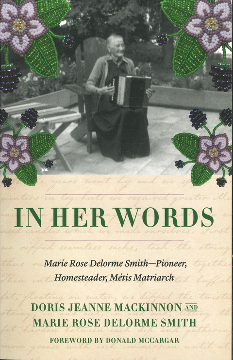 Open book titled "In Her Words" by Heritage Group, showcasing pages with handwritten stories and personal narratives.